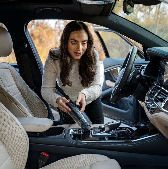 How to Vacuum Between a Car Seat and Center Console: A Step by Step Guide